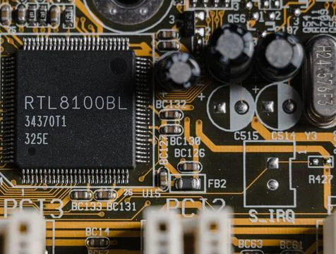 Detailed Close-Up of Computer Circuit Board Technology Components Stock Photos