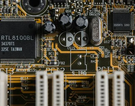 Detailed Close-Up of Computer Circuit Board Technology Components Stock Photos