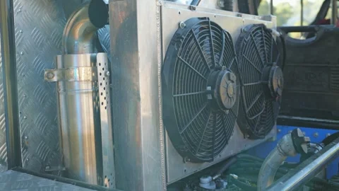 Detailed close-up of a modified race UTV's cooling and exhaust Vídeo Stock 344875731