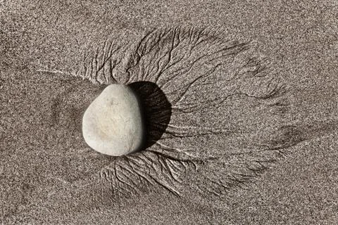 Detailed close up of pattern formed by waves on the beach Stock Photos