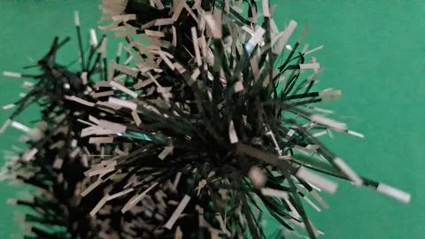 Detailed close up of a small artificial silver tinsel tree Stock Photos
