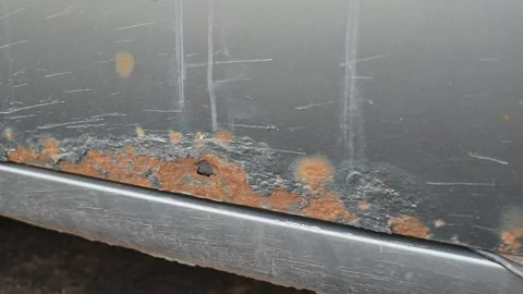 Detailed close-ups of rust and scratches on a vehicle's surface. Ideal for Vidéo 337550637
