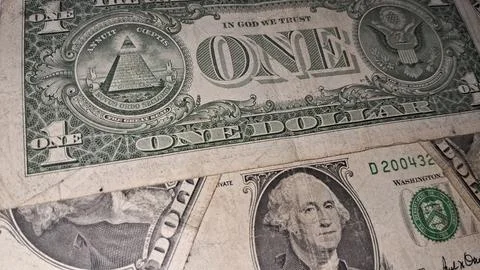 Detailed close up view of several one dollar bill banknotes Stock Photos
