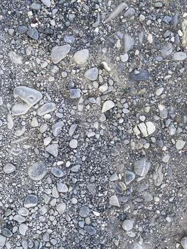Detailed close-up view of a textured surface composed of small and medium-siz Stock Photos