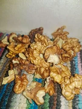 A detailed close-up of the walnut kernel elegantly reveals its core, exposing Stock Photos