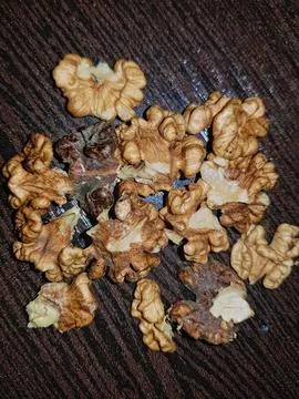 A detailed close-up of the walnut kernel gracefully unveils its interior Stock Photos