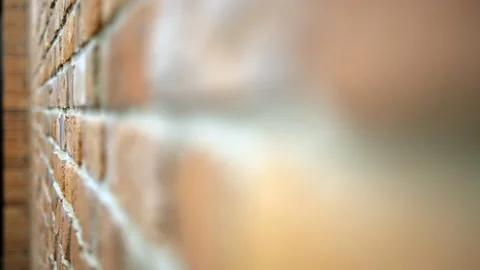 A detailed closeup image of a clear and focused brick wall, showcasing depth of Stock Footage 276538734