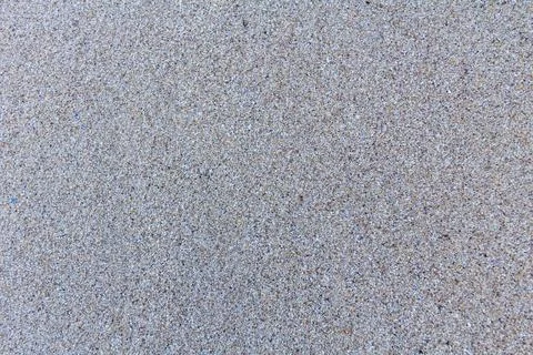 Detailed closeup of sand pattern of a beach Stock Photos