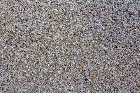Detailed closeup of sand pattern of a beach Stock Photos