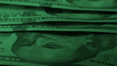 Detailed CloseUp of a Stack of Money Presented in a Green Tone Aesthetic and Stock Footage 306067427