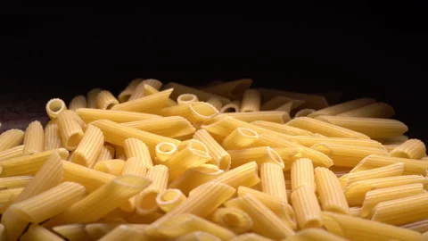 Detailed closeup of uncooked raw pasta, Minimal food concept Stock Footage 316835976