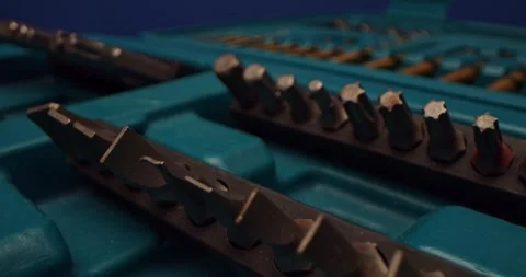 A detailed closeup view of a comprehensive tool set showcasing various bits and Stock Footage 297953195