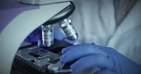 Detailed CloseUp View of Microscope Documented in Laboratory Environment 스톡 동영상 299903280