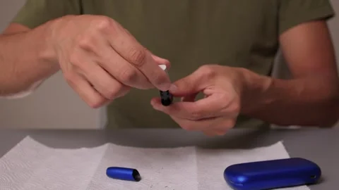 A Detailed Comparison of Two Types of Smoking Devices Clean Versus Used Options Stock Footage 313630153