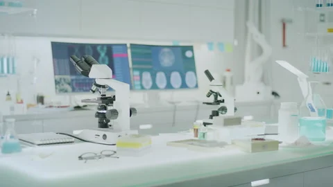 Detailed coronavirus and DNA model on computer screen. Empty laboratory Stock Footage