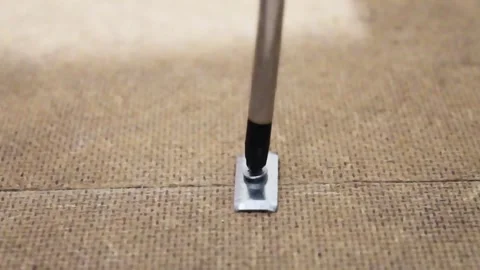 A detailed demonstration on using a marking pen for accurate alignment in Stock Footage 292753928