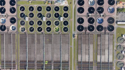 Detailed Drone Capture of Clarifier Basins, Sludge Digesters, and Piping Stock Footage 312867997