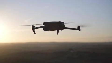 A detailed drone flying when the sun is setting Stock Footage 240397973