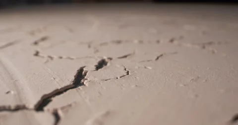 Detailed extreme close-up surface of decorative plaster craquelure. beige shade Video stock 150256943