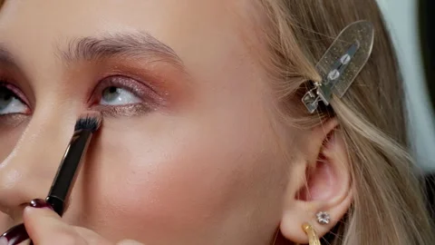 Detailed Eye Makeup Application Close-Up Stock Footage 263890994