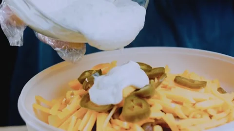 Detailed fine dining angle: arranging the loaded potato salad Stock Footage 342198838