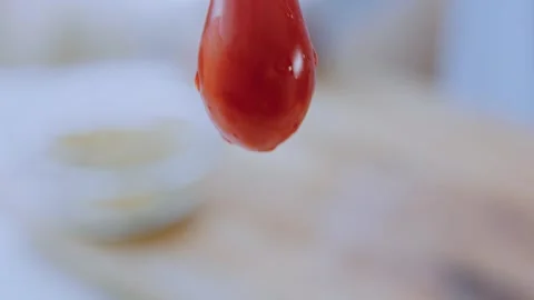 Detailed finished meal angle: adding walnuts and spices to the sauce Stock Footage 342200957
