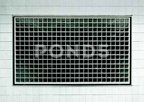 Detailed horizontal view of a large glass tile window Stock Photos