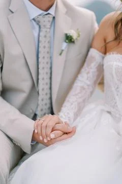 Detailed Image Capturing Bride And Groom With Wedding Accessories Foto stock