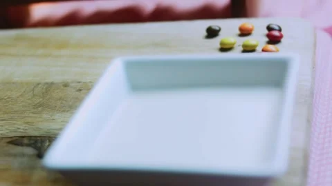 Detailed ingredient study of filled flan dish resting on a wooden table Stock Footage 342154040