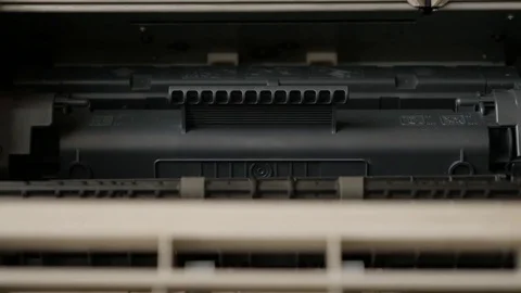 Detailed interior of modern laser printer with toner slow tilt Stock Footage 76649019