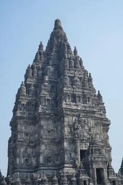 Detailed low angle view of stone spire top architecture at Prambanan temple. 스톡 사진