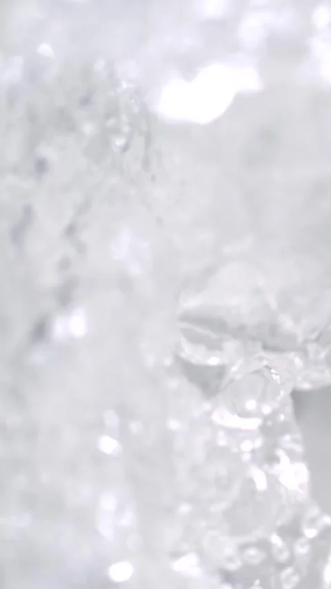 Detailed Macro Capture Of Splashing Icy Water Droplets In Motion Stock Footage 331233326