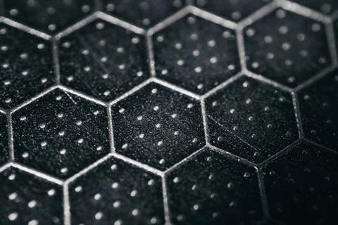 A detailed macro image showing the hexagonal pattern and dotted. Stock Photos