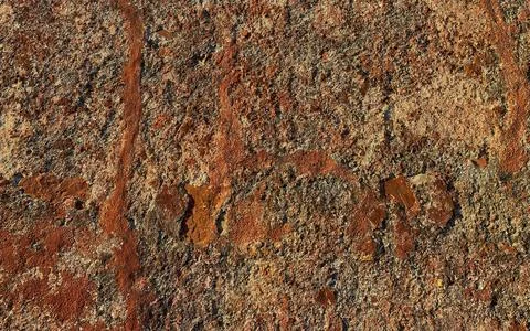 Detailed Macro Texture of Rusty Reddish Rock Surface with Gritty Grains and.. Stock Photos