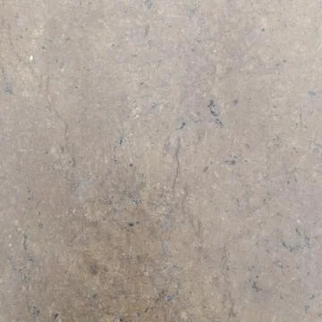 Detailed macro texture of smooth flat brown stone surface showing flaws Stock Photos