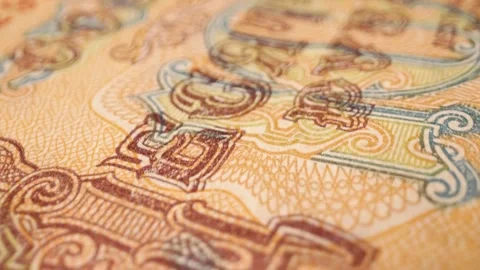 Detailed macro view of a 10-ruble Soviet banknote (1961–1993) in motion. 스톡 동영상 301549505