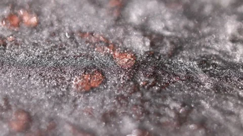 Detailed macro view of dark platinum paint with specialized sandy texture and Stock Footage 327603143
