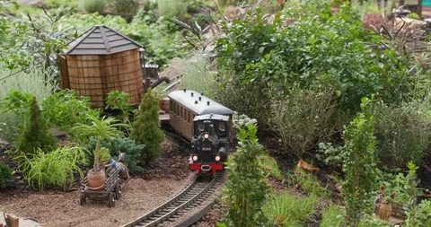 Detailed Model Train Set in Miniature Town with Water Tank Stock Footage 99462291