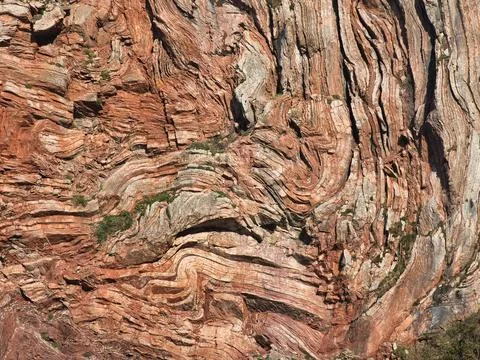 Detailed Pattern of Folded Red Rock Layers - Abstract full-frame close-up o.. Stock Photos