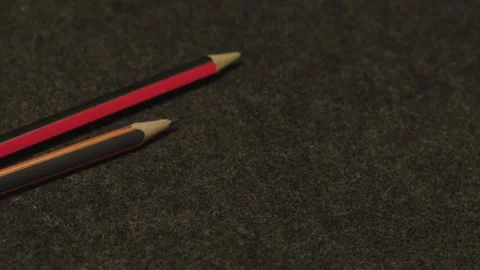 Detailed pencils on textured surface Stock Footage 333489413