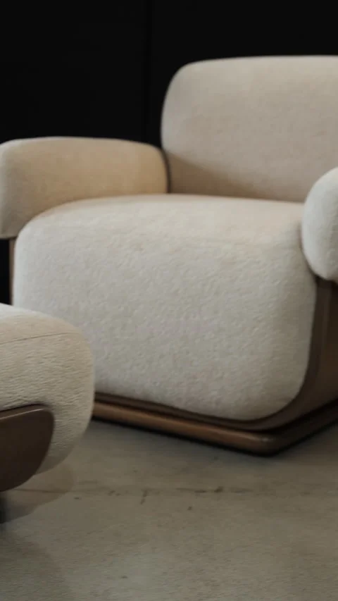 Detailed plan, visual tour of designer armchair and footrest with rounded shapes Stock Footage 344619181