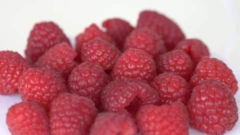 Detailed raspberry surface with soft light emphasizing natural structure and Stock-Footage 332875749