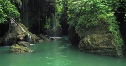 Detailed River Flow Over Rocks with Clear Water Tropical Aerial Shot Stock Footage 332491599