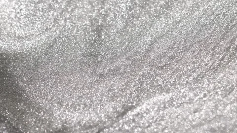 Detailed rotating close-up of bright silver paint specialized sandy texture and Stock Footage 327604351