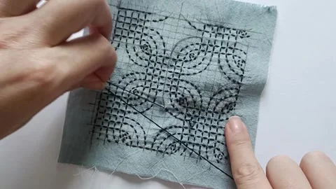 Detailed Sashiko Stitching on Fabric. Stock Footage 344923377