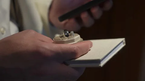 Detailed Scene Of Audiologist Customizing Hearing Device With Patient In Stock Footage 323774813
