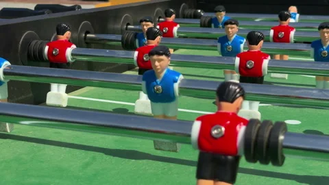 Detailed Shot Capturing Dynamic Action Of Tabletop Soccer Game In Cozy Stock Footage 337939274