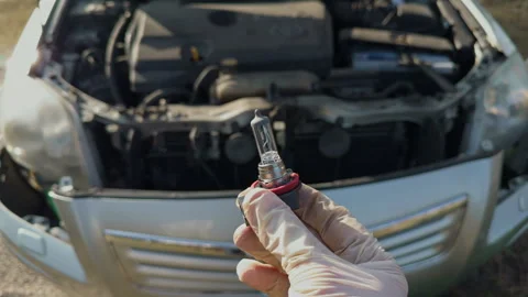 Detailed shot of technician analyzing engine wiring and socket connections Stock Footage 332355050