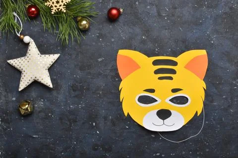 Detailed step-by-step instructions for making tiger masks from paper for chil Stock Photos