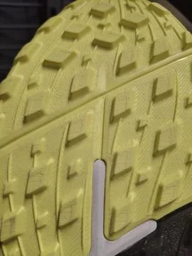Detailed studs and surface of a soccer cleat Stock Photos